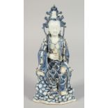 A CHINESE BLUE AND WHITE PORCELAIN FIGURE OF GUANYIN, 29cm high.