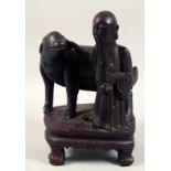 A LARGE 19TH CENTURY CARVED WOODEN FIGURE OF SHAO LOU AND DEER, (lacking antlers) raised upon a