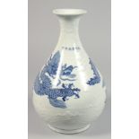 A CHINESE BLUE AND WHITE PORCELAIN YUHUGHUNPING VASE painted with a large dragon and further