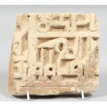 A 13TH / 14TH CENTURY PERSIAN ILKHANID TILE with early Kufic calligraphy, 15.5cm x 14cm