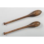 A PAIR OF 19TH CENTURY INDIAN EXERCISE WOODEN CLUBS, 53cm long