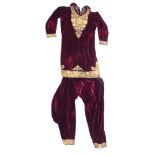 A SUPERB INDIAN PATIALA VELVET AND EMBROIDERED GOLD WIRE DRESS, lavishly adorned with gold wire