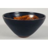 A JIZHOU KILN POTTERY BOWL, 12cm diameter.