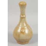 A CHINESE CRACKLE-GLAZE BOTTLE VASE, with moulded twin handles, 28cm high.