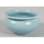 A SMALL CHINESE POWDER BLUE GLAZE BOWL, with mark to base, 10cm diameter.