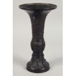 A CHINESE ARCHAIC STYLE BRONZE GU VASE, 25cm high.