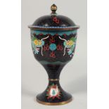 A CHINESE BLACK GROUND CLOISONNE PEDESTAL BOX AND COVER, decorated with dragons and the flaming