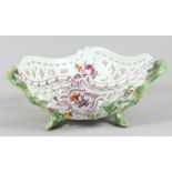 A GOOD MEISSEN PIERCED TWO HANDLED BASKET painted and encrusted with flowers. Cross swords mark in