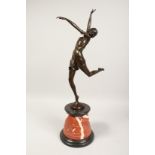 AFTER B. ZACH. A BRONZE DANCER on a marble base. Signed. 26ins high.