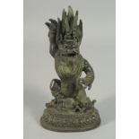 A SMALL CHINESE ANGRY GOD BRONZE FIGURE