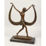 A BRONZE ART DECO DANCER on a black base.