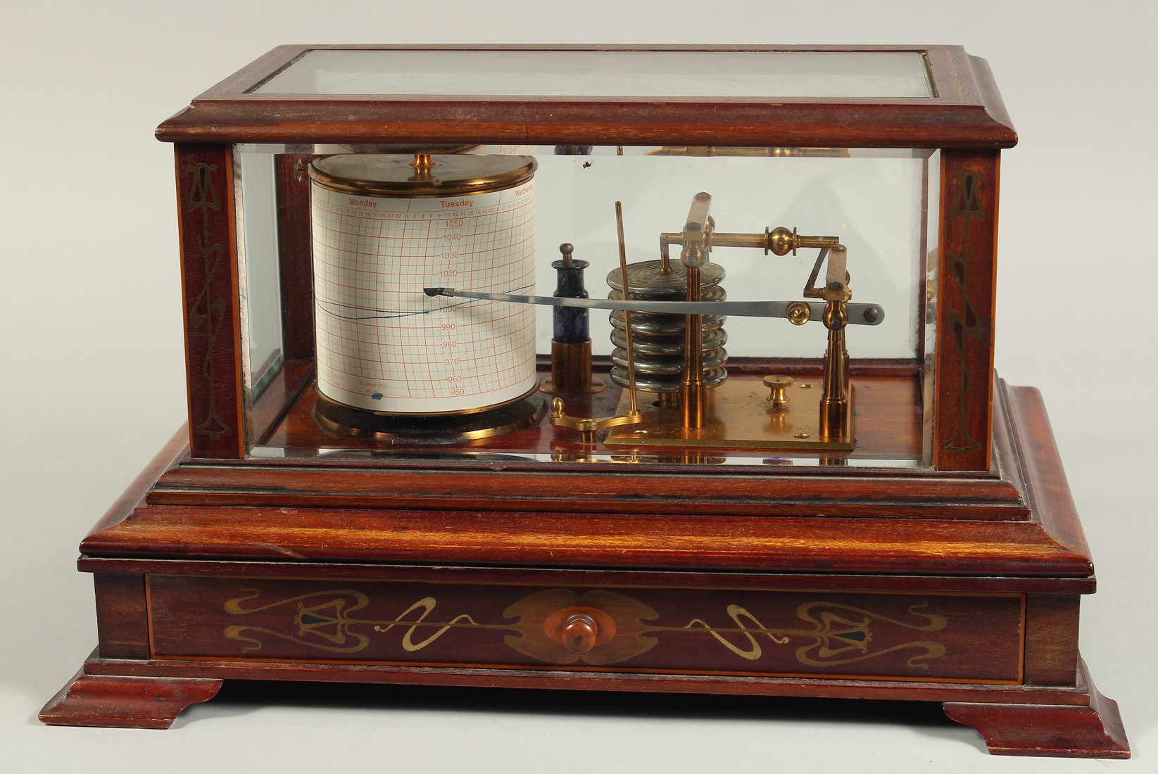 A VERY GOOD BAROGRAPH in a glass and mahogany case with spare charts and ink