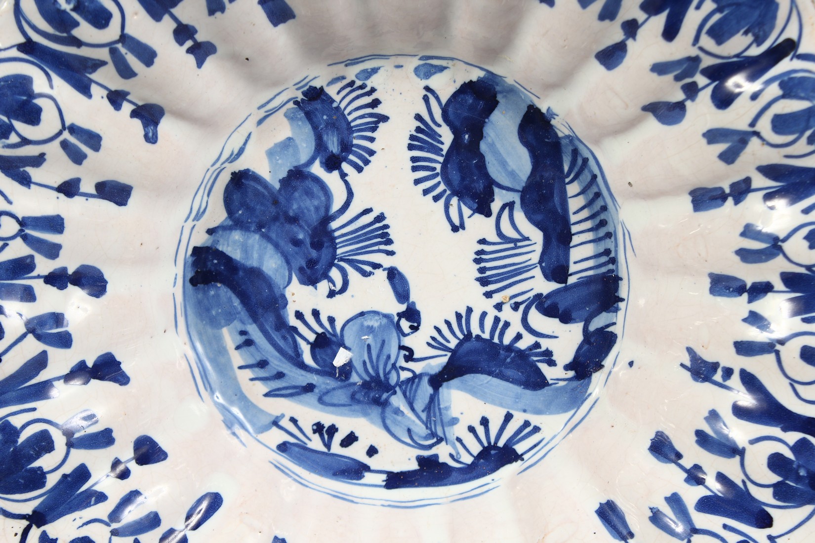 A 19TH CENTURY BLUE AND WHITE DEEP CHARGER with Chinese design. 10ins diameter. - Image 2 of 3