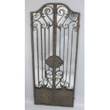 A WROUGHT IRON FOLDING GARDEN MIRROR. 4ft 11Iins X 2ft (closed).