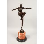 AFTER J PHILIPPE A BRONZE DANCER on a marble base. Signed. 22ins high.