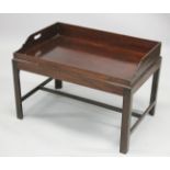 A 19TH/ 20TH CENTURY MAHOGANY BUTLERS TRAY on stand. 2ft 10ins long x 1ft 1.0.5ins wide x 1ft