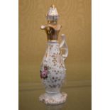 A French gilt decorated porcelain ewer and stopper.