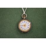 A ladies' silver and enamel fob watch.