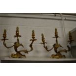 A pair ormolu three branch candelabra.