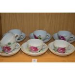 A set of six continental floral decorated cups and saucers.