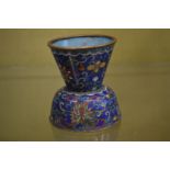 A small cloisonne vase.