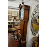 A 19th century oak longcase clock with painted arched dial.