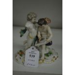 A small Meissen group of two cherubs (af).