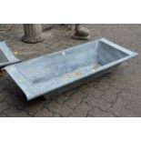 A galvanised garden trough/planter.