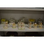 A quantity Pastel Burner cottages and Royal Doulton Bramley Hedge mice.