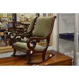 A child's mahogany framed rocking chair.