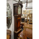 A 19th century longcase clock with painted arch dial.