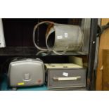 An old watering can, projectors, projector screens etc.