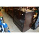 A military style two-part chest of drawers.