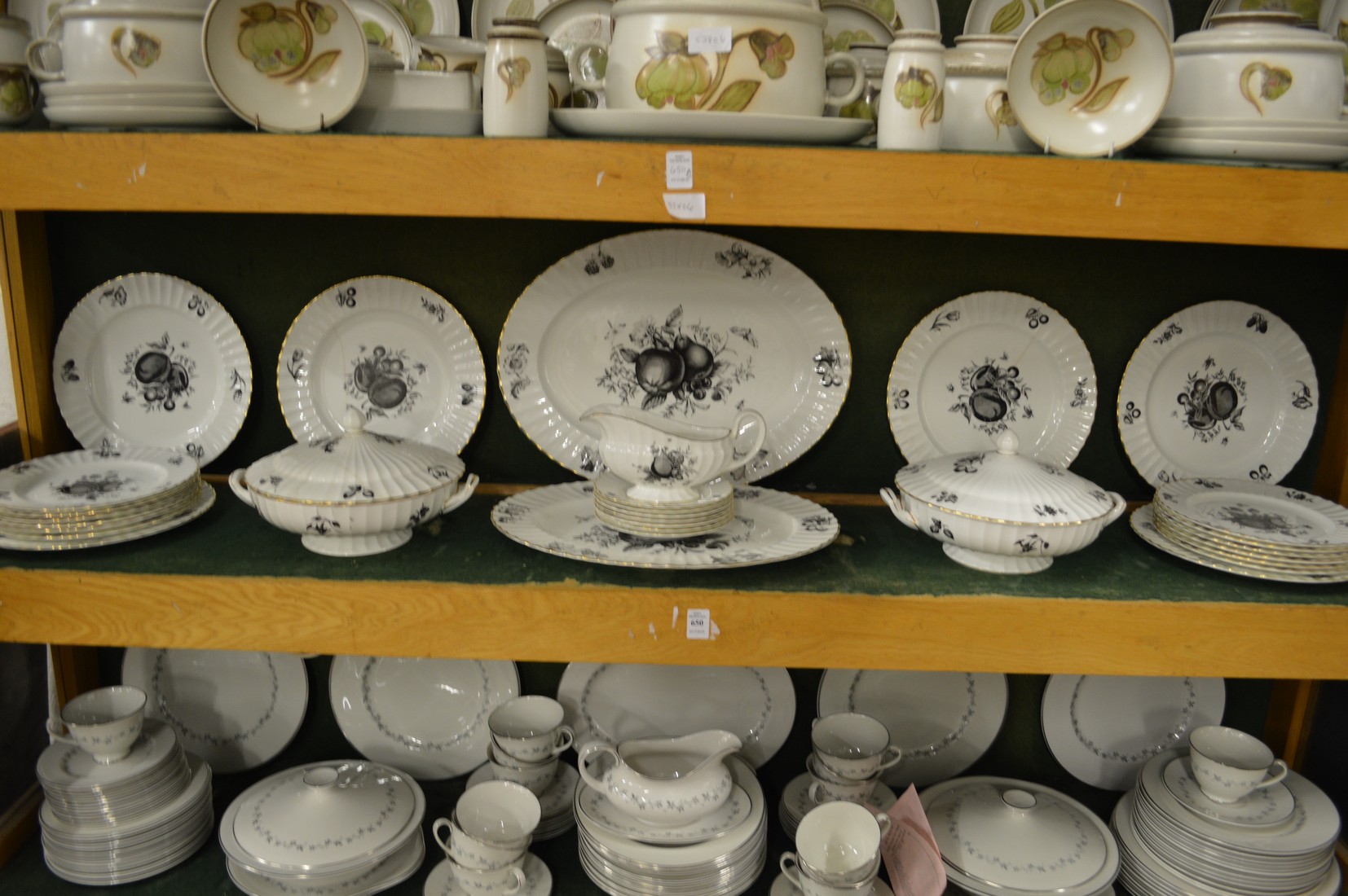 A quantity of Royal Worcester dinnerware decorated with fruit.