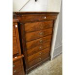 A French mahogany seven drawer chest.
