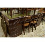 A reproduction mahogany partners desk.