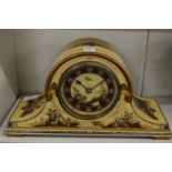 A chinoiserie decorated mantel clock.