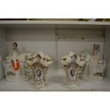 A pair of floral decorated vases and a pair of Staffordshire figures of the prince and princess of