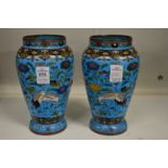 A pair of Japanese cloisonne vases (one damaged).