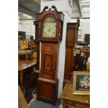 A 19th century mahogany longcase clock with painted arched dial.