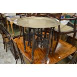 An Eastern brass tray table.