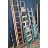 Various ladders access equipment, sawing horse.