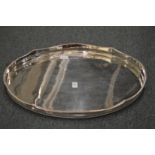 A silver plated oval twin handled galleried tray.