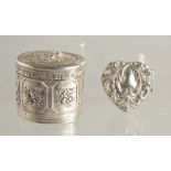 A SMALL FRENCH OVAL SILVER BOX AND COVER 1.25ins and a heart shaped box. (2).