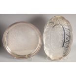 TWO SILVER PLATED TRAYS WITH GALLERIES. 14ins diameter and 17ins long.