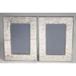 A PAIR OF PLAIN SILVER UPRIGHT PHOTOGRAPH FRAMES embossed with harebells. 8ins x 5.5ins. London