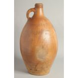 A VERY LARGE EARLY STONEWARE FLAGON. 18in high.