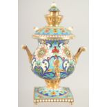 A MINIATURE RUSSIAN SILVER GILT AND CLOISONNE ENAMEL SAMOVAR. 3.75ins high, Mark 84