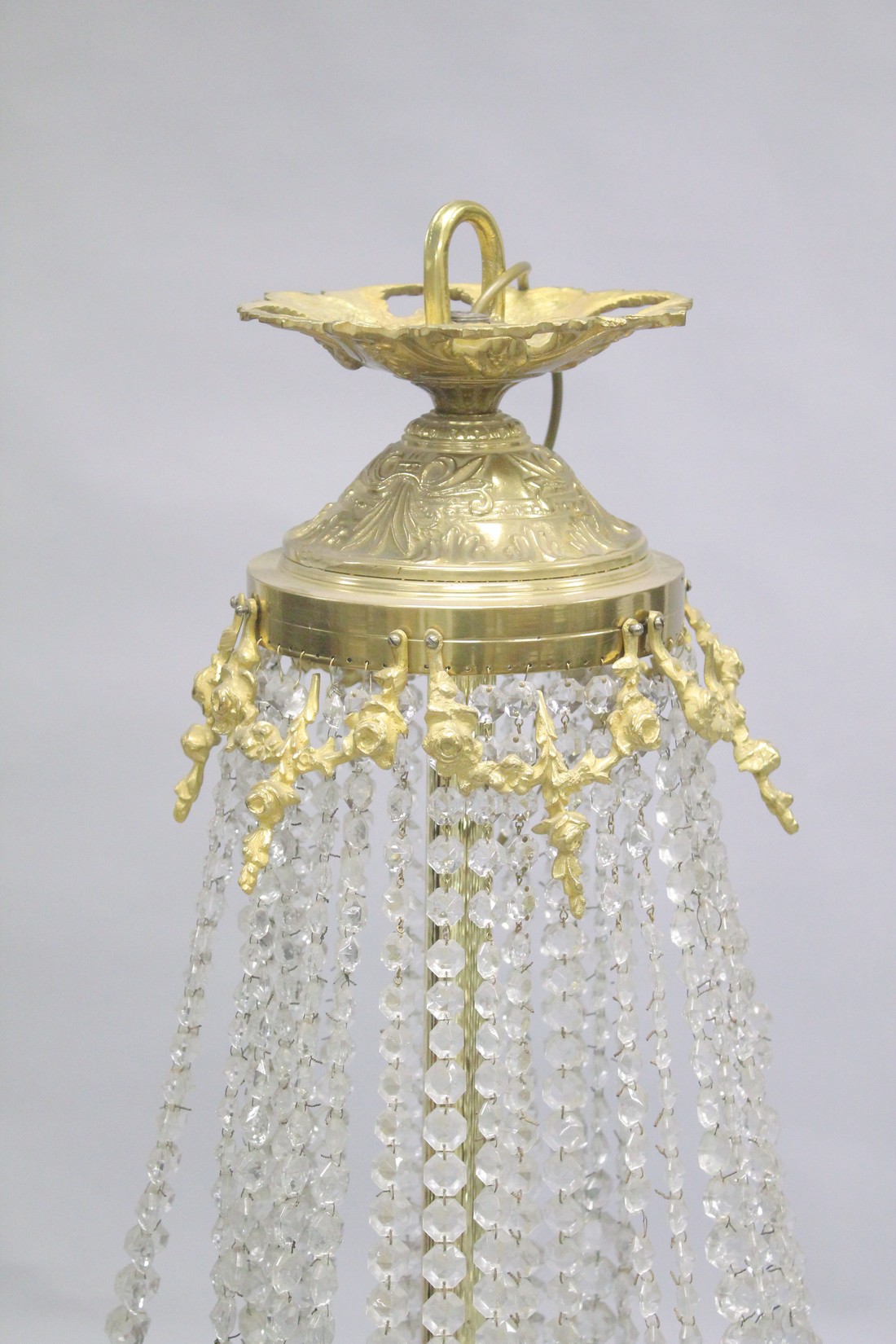 A LARGE ORMOLU AND CRYSTAL CIRCULAR CHANDELIER with four rows of prism drops, six triple pairs of - Bild 2 aus 5
