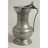 A GOOD 18TH CENTURY SWISS PEWTER FLAGON AND COVER. 10ins high.